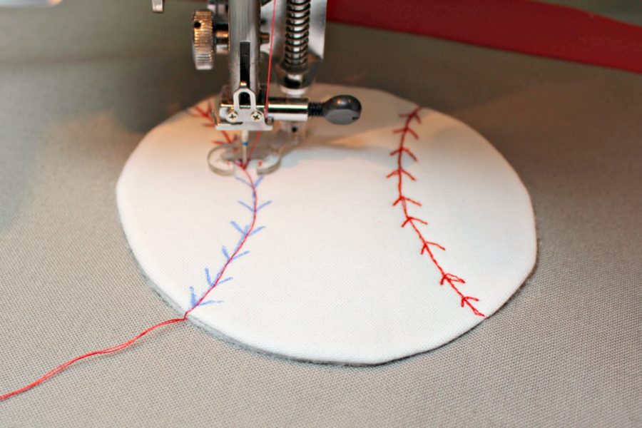 Carla Henton stitching HeatNBond Fleece baseball