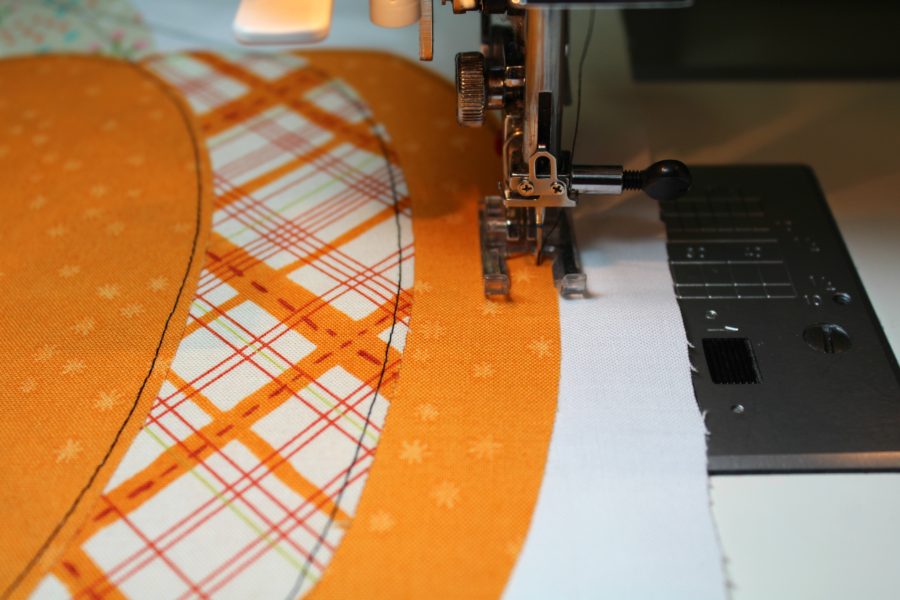 stitching pumpkin quilt block