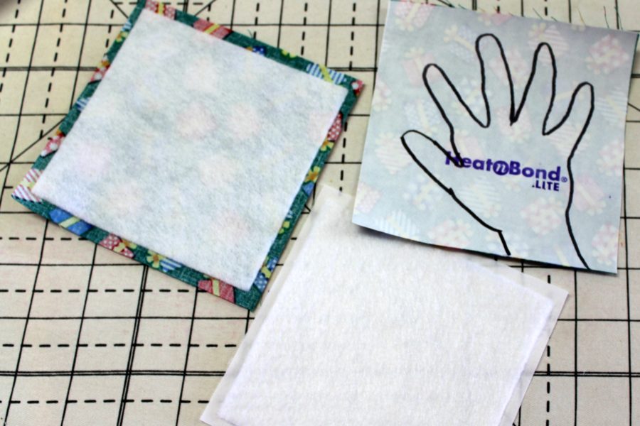 Thermoweb products fused to the back of fabrics for keepsake handprint ornament by carla at creatin' in the sticks