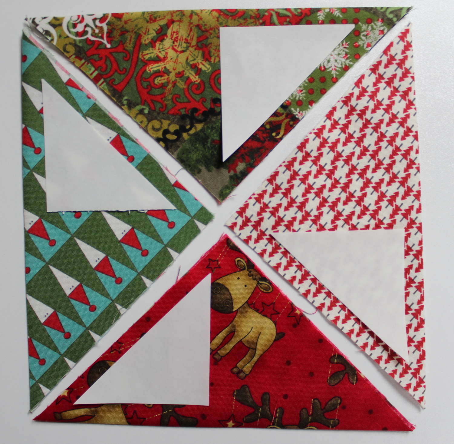 four triangles on fabric