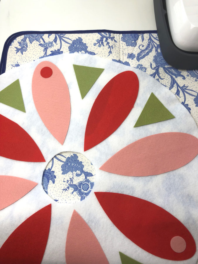fuse all of your petals, circles and triangles to create a no sew tree skirt
