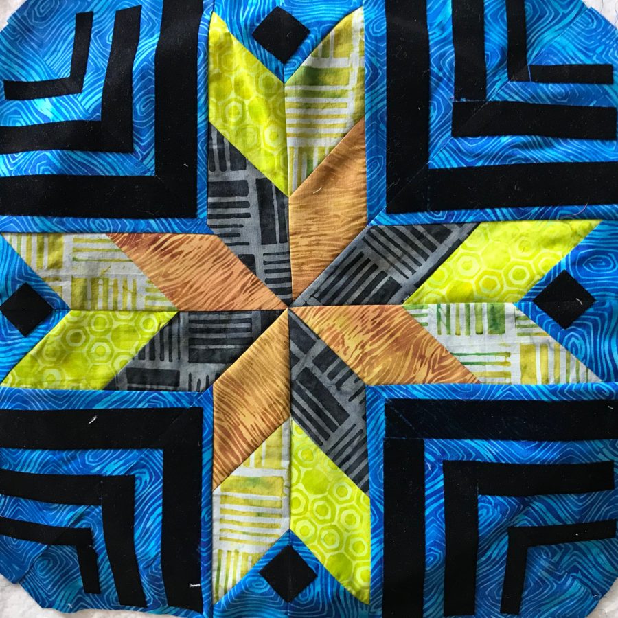 mini island batik quilt with flock
