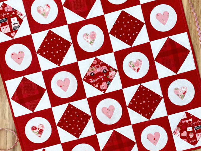 Love On Point Small Quilt by Belinda Karls-Nace