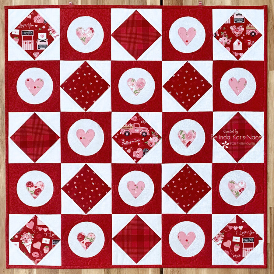 Love On Point Small Quilt by Belinda Karls-Nace